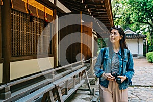 Photographer looking around the Japanese building