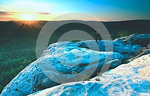 Photographer looks into the landscape and listen the silence