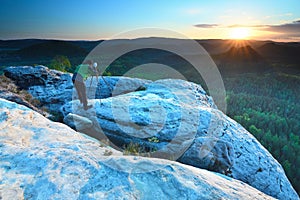 Photographer looks into the landscape and listen the silence