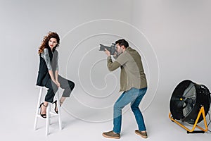 Photographer and model on fashion shoot