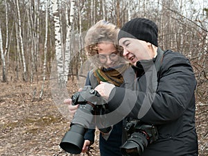 Photographer and model in nature in spring