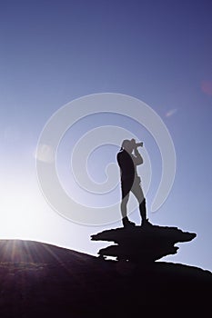 Photographer in morning light