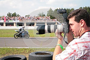 Photographer on motorcycle race