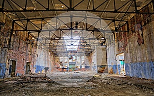 Photographer in an old abandoned factory