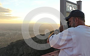 A Photographer on the Sandia Peak Aerial Tramway Observation Dec