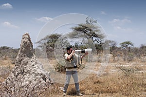 Photographer in the savannah - profile