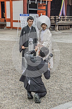 Photographer At A Shinto Wedding At Yasaka Kyoto Shrine Japan