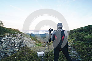 Photographer is Shooting in the Mountains