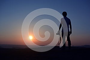 Photographer silhouette in the sunrise