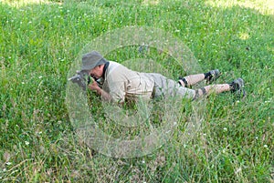 Photographer on a spring meadow