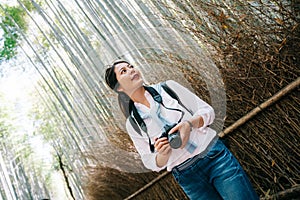Photographer standing next to the bamboo forest