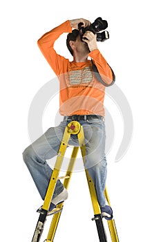 Photographer On The Stap-Ladder