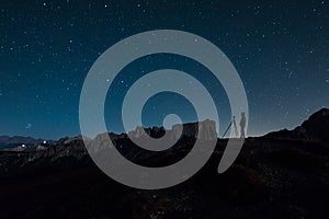 A photographer among the stars at the Giau pass in the dolomites