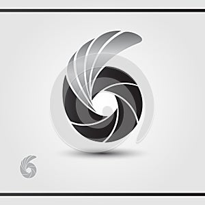 Photographer Studio Logo Design. Vector logo template. Black lamella with silver wing. Camera focus. Watermark