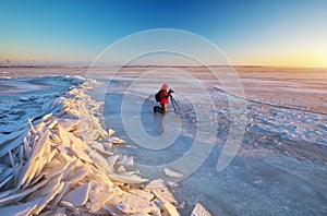 Photographer take pictures on the river bank