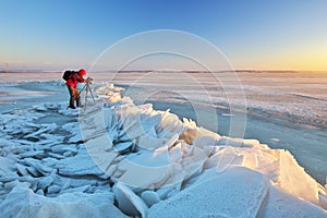 Photographer take pictures on the river bank