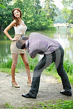 Photographer takes photo of young