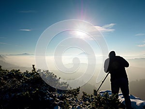 Photographer takes picture of freeze autumnal daybreak