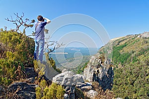 Photographer taking photo of beautiful view of Blyde river canyon