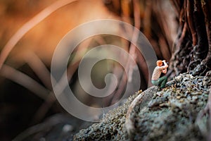 Photographer taking a photo of nature