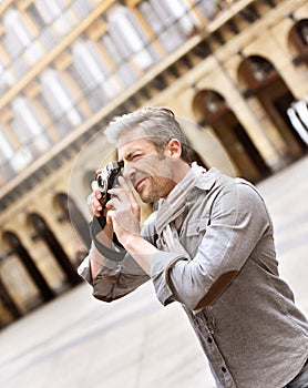 Photographer taking pictures in historical area