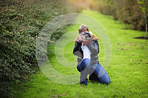 Photographer taking pictures outdoors