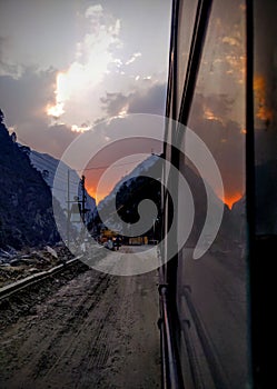 Photographer trevel on street during sunset Time