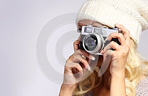 Photographer. Unrecognizable blonde young woman ta