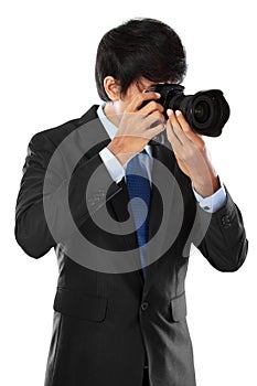 Photographer using dslr camera