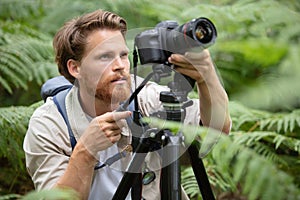 photographer using tripod to take photos