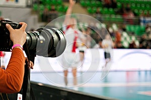 Photographer at volleyball match