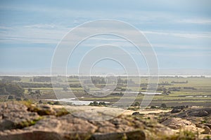 Photographer walks through the dunes of the Cabo Polonia National Park in the Department of Rocha in Uruguay photo