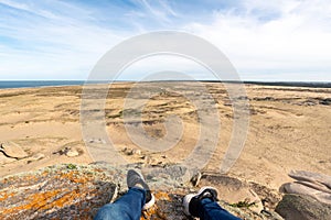 Photographer walks through the dunes of the Cabo Polonia National Park in the Department of Rocha in Uruguay photo