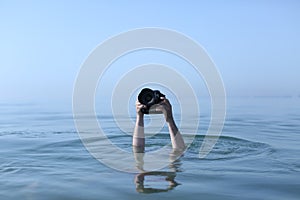 Photographer in water