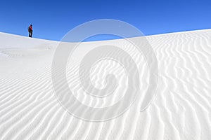 Photographer on White Sand Dunes
