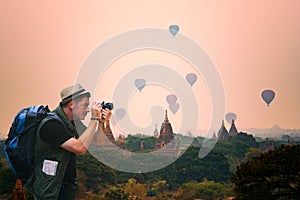 Photographer young touristman journey in Bagan Pagoda Mandalay
