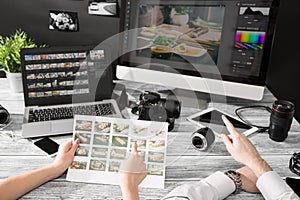 Photographers computer with photo edit programs.