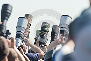 Photographers taking a shot of the airplanes - lenses pointing up