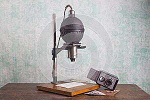 Photographic enlarger, darkroom equipment