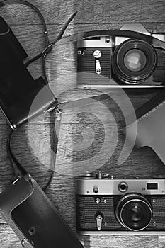 Photographic equipment - old retro film photo cameras and leather cases