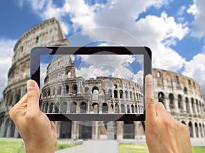 Photographing coliseo in rome photo