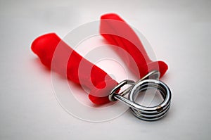 Photographing exercise equipment handgrip on a white background