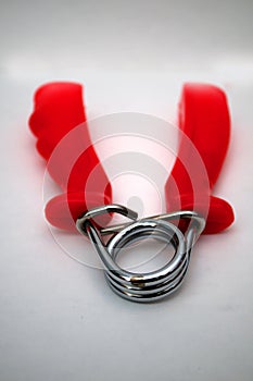 Photographing exercise equipment handgrip on a white background