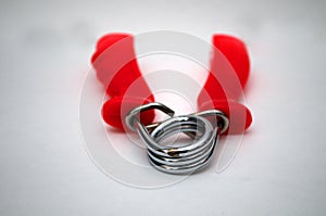 Photographing exercise equipment handgrip on a white background