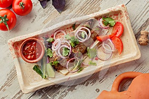 Photographing food flat lay Caucasian cuisine. Delicious Georgian dish on the table.