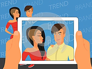 Photographing of happy couple on blue background