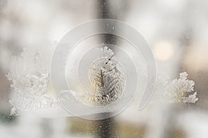 Frosty patterns on the edge of a frozen window