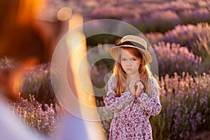 Photographing a small girl in a field of lavender