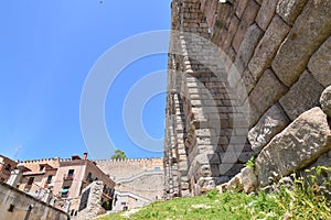 Photographs From The Base Of The Aqueduct To Be Able To Intuit Its Greatness In Segovia. photo