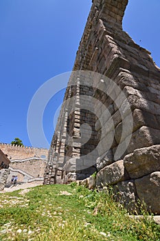 Photographs From The Base Of The Aqueduct To Be Able To Intuit Its Greatness In Segovia. photo